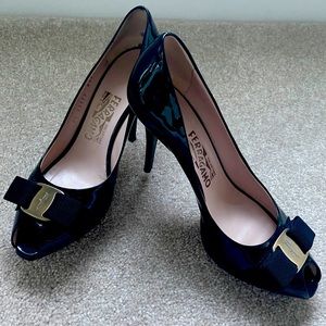 Black patent leather peep toe heels